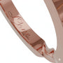 Inside engraving of a Dimis Designs 18K rose gold twist ring, symbolising love and connection